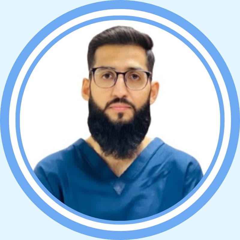 Dr. Sadeeq Ur Rehman treating a patient